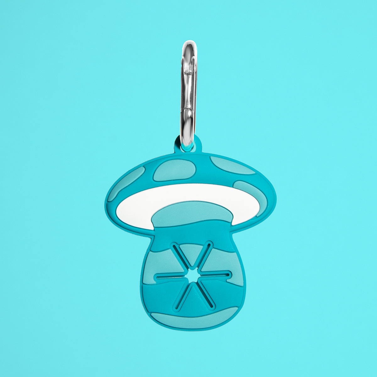 Mushroom Stink Link teal silicone mushroom poop bag carrier with silver carabiner, front view