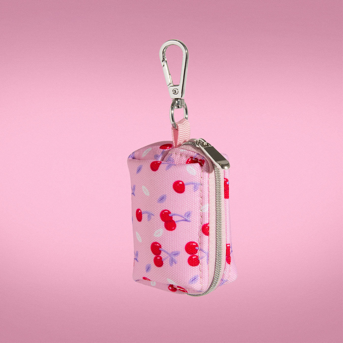 Cherry Crush waste bag holder clipped onto a leash