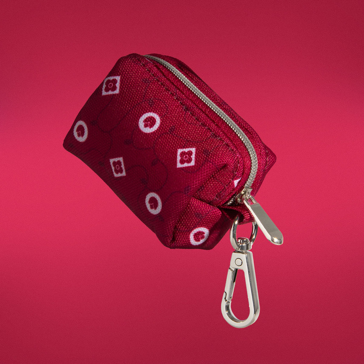 Dandy Dame waste bag holder in deep crimson monogram print, front view