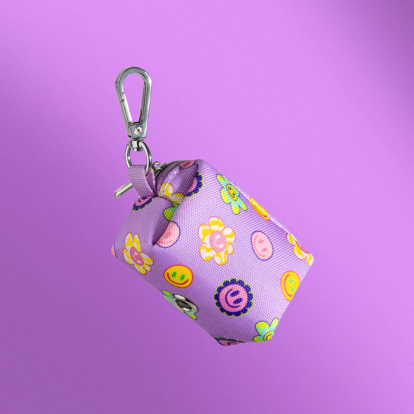Flower Power waste bag holder showing carabiner clip attachment