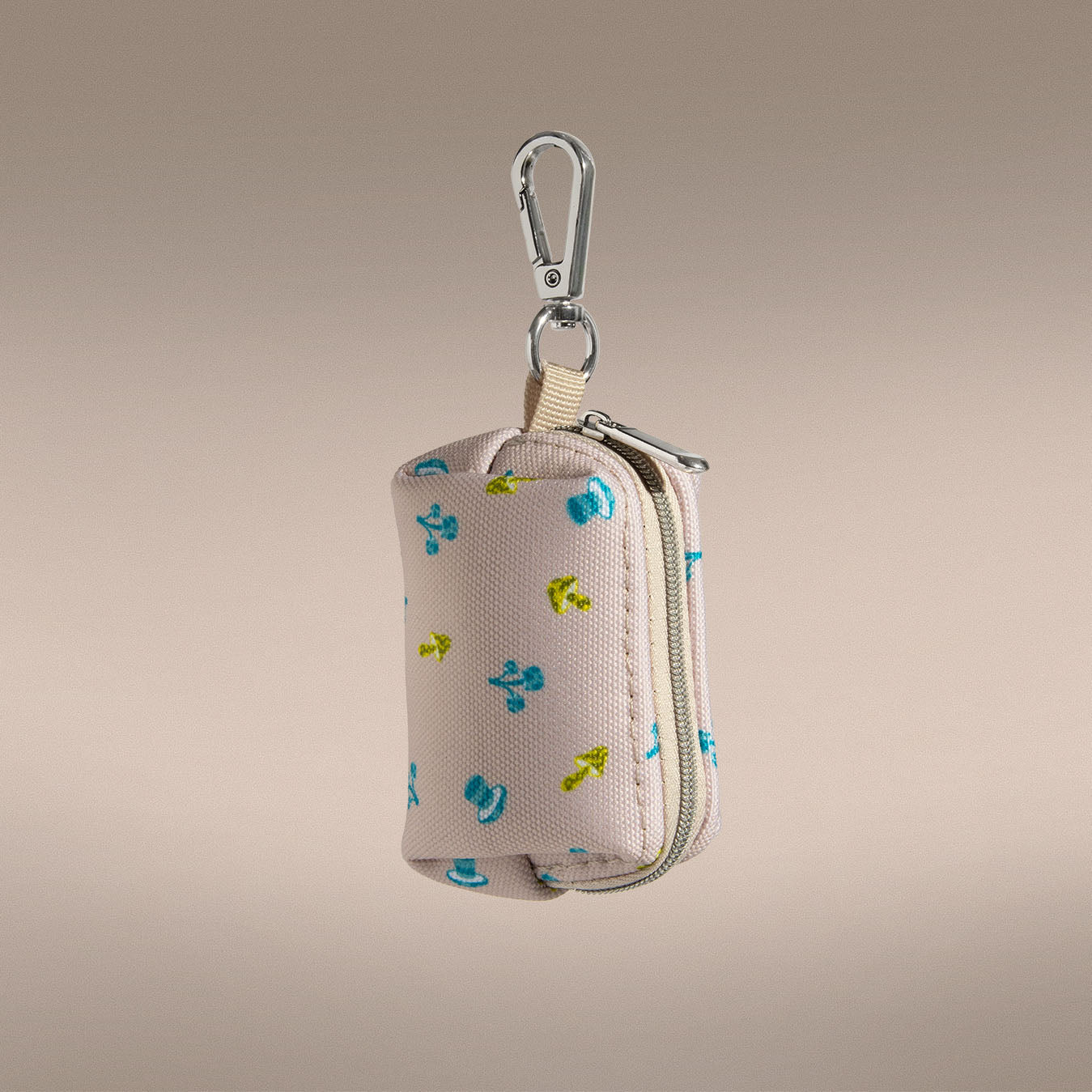 Mini Mushies waste bag holder open showing bag dispenser interior | One of Us